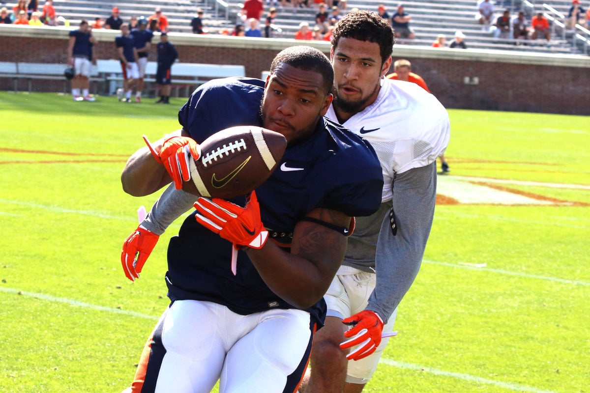 Doni Dowling and Quin Blanding at Virginia football practice.